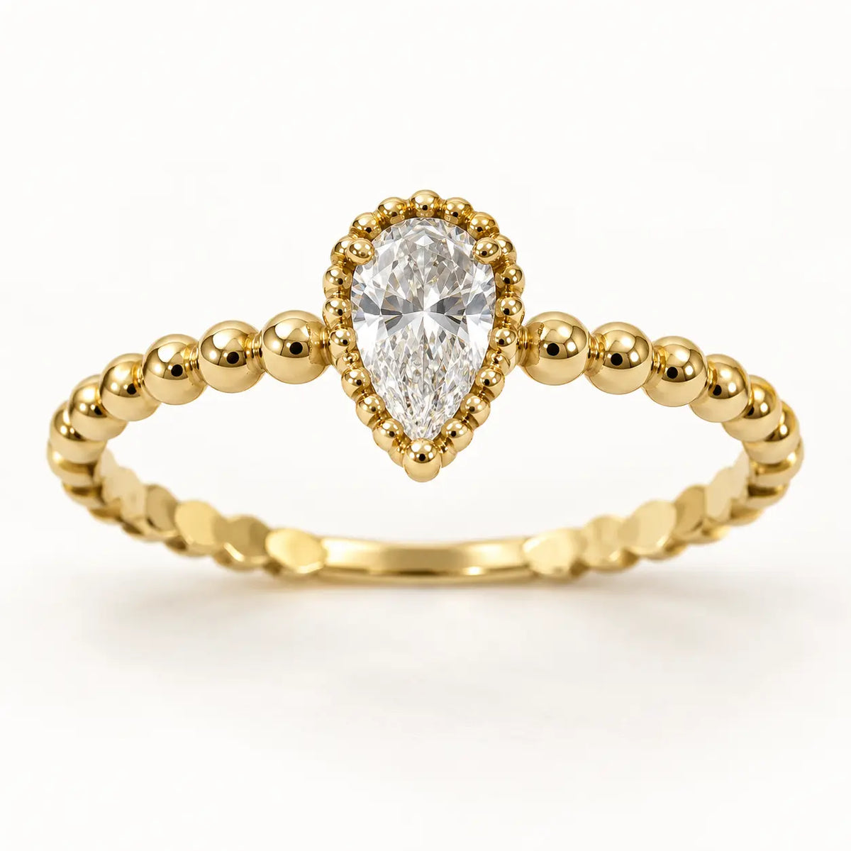 10K yellow gold pear-shaped beaded ring product photo